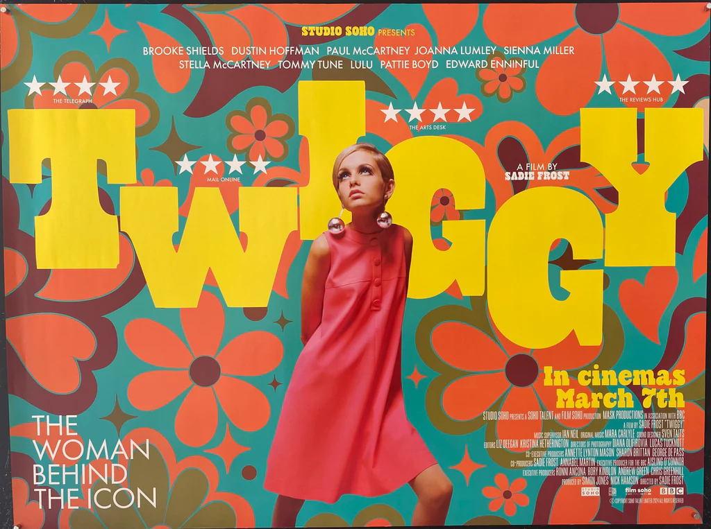 Image of 60s model Twiggy in front of a 60s floral inspired pattern.